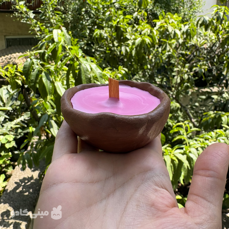 شمع در ظرف گلی
